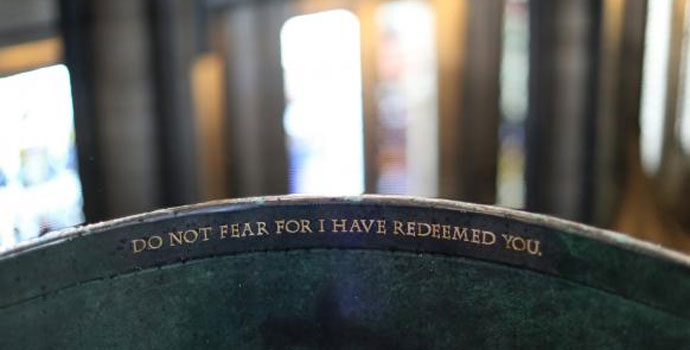 "Do not fear for I have redeemed you" is written on the baptismal font at Salisbury Cathedral in England. Photo by Kathleen Barry, United Methodist Communications.