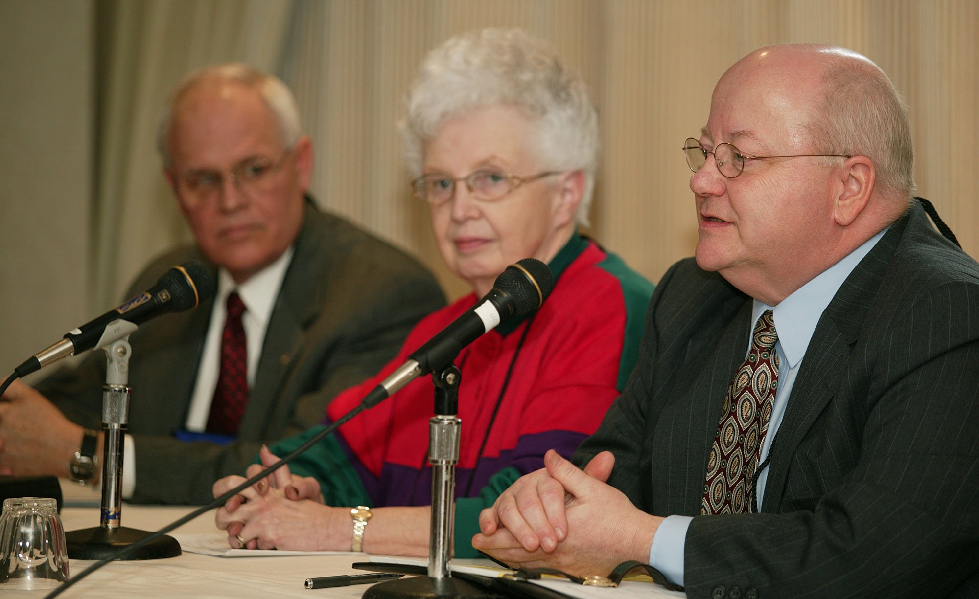 As chairperson of the Commission on the General Conference, the Rev. James Perry (right) discusses how General Conference operates. UMNS photo by Mike DuBose