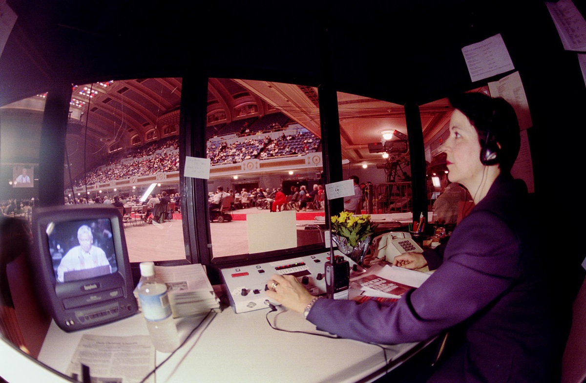 Nilda Ferrari, head of translators for the United Methodist Church's 2000 General Conference, monitors translation during a plenary session. UMNS photo by John C. Goodwin