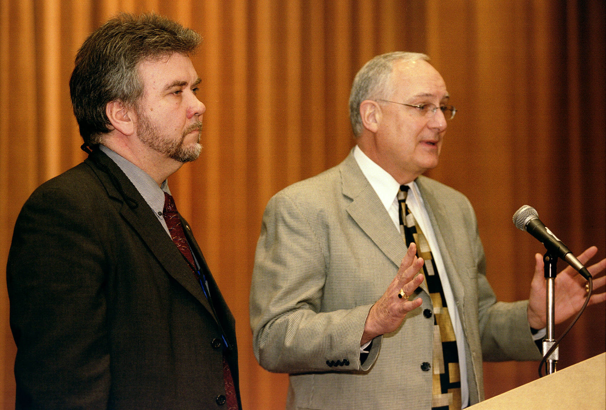 Oyvind Helliesen (left) and Daniel K. Church present the "Living into the Future" plan during the Pre-General Conference News Briefing in Pittsburgh. UMNS photo by Mike DuBose