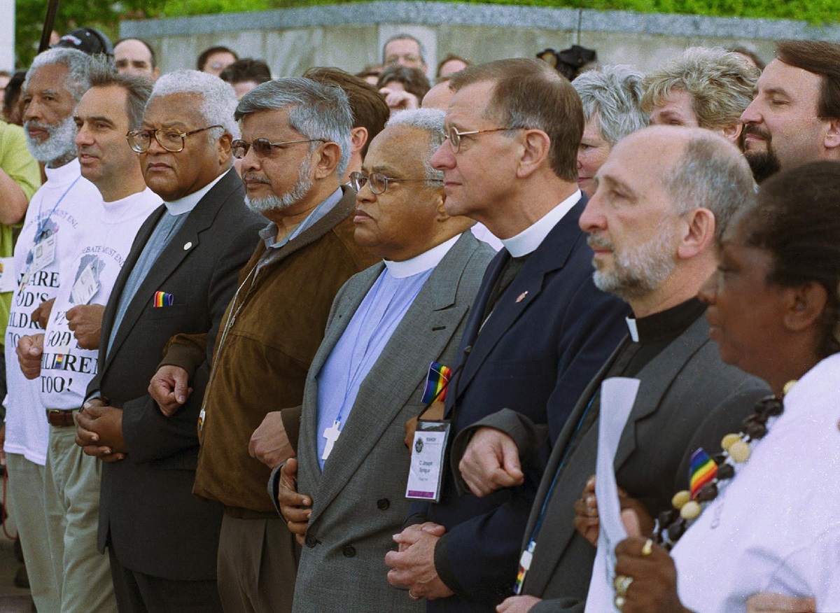 Leaders of a protest against the United Methodist Church's policies against homosexuals block the entrance to the Cleveland Convention Center. UMNS file photo by Paul Jeffrey