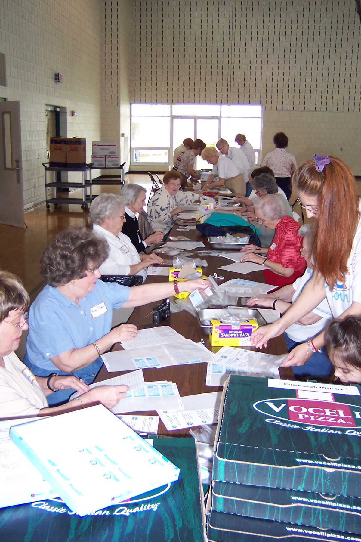 Volunteers at Christ United Methodist Church in Bethel Park, south of Pittsburgh, packed nearly 4,000 cookies to be distributed at the 2004 General Conference. Providing cookies is traditional role for the host conference at denomination's top legislative meeting