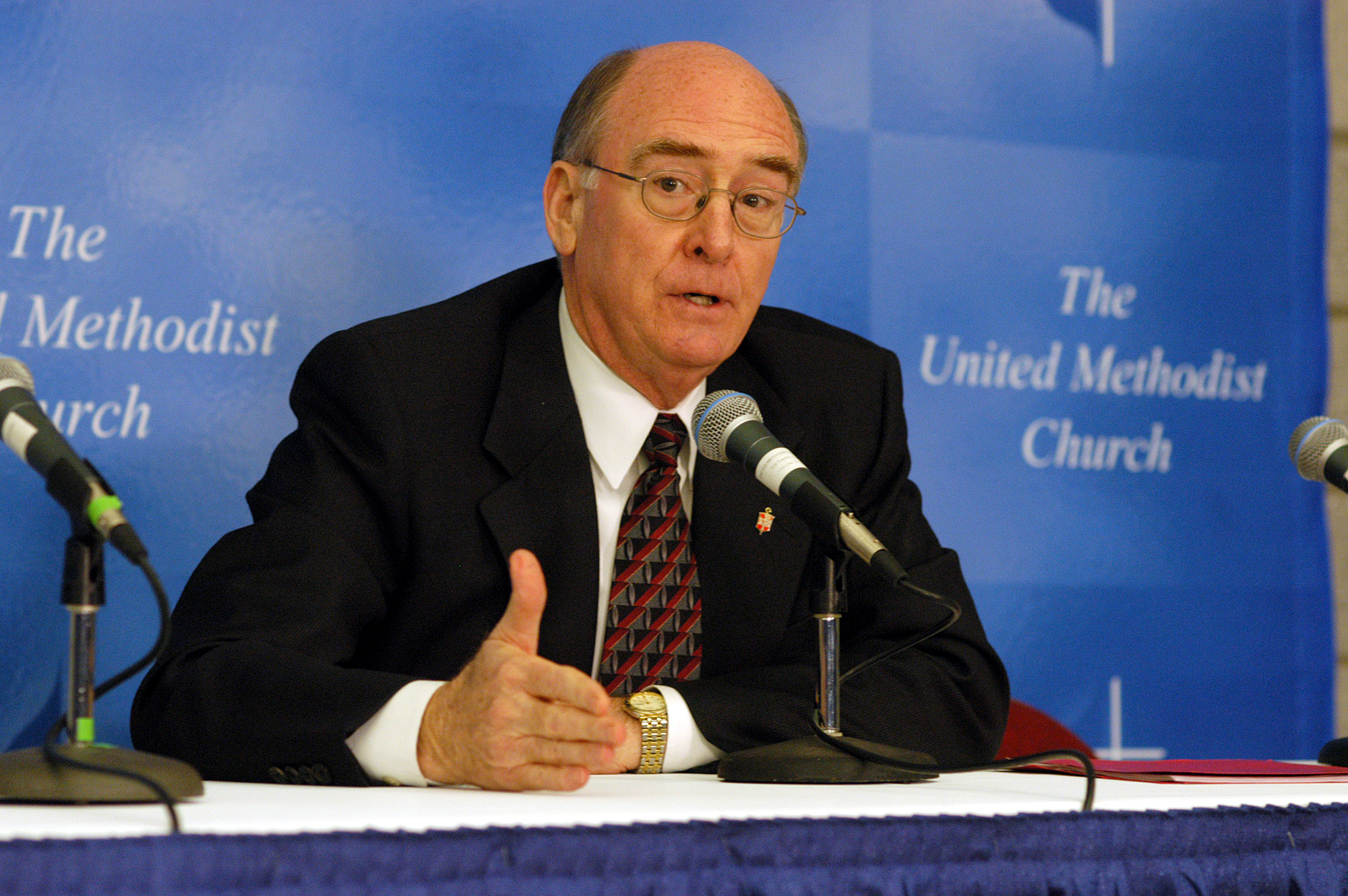 United Methodist Bishop Kenneth L. Carder answers questions during a press conference following the Episcopal Address at the 2004 General Conference in Pittsburgh. A UMNS photo by John C. Goodwin.
