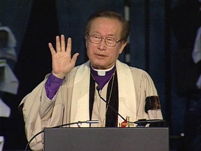 Bishop Hae-Jong Kim gives the  May 3 morning message at General Conference 2004. Video still by United Methodist Communications