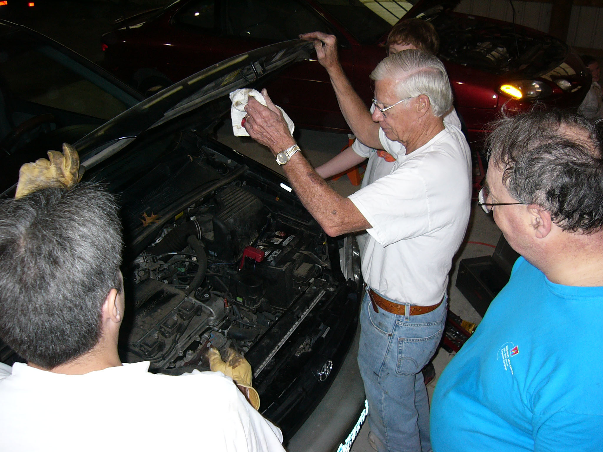 Volunteers from McEachern Memorial United Methodist Church in Powder Springs, Ga., repair cars for needy people once a month. A UMNS photo by Lyle Jackson