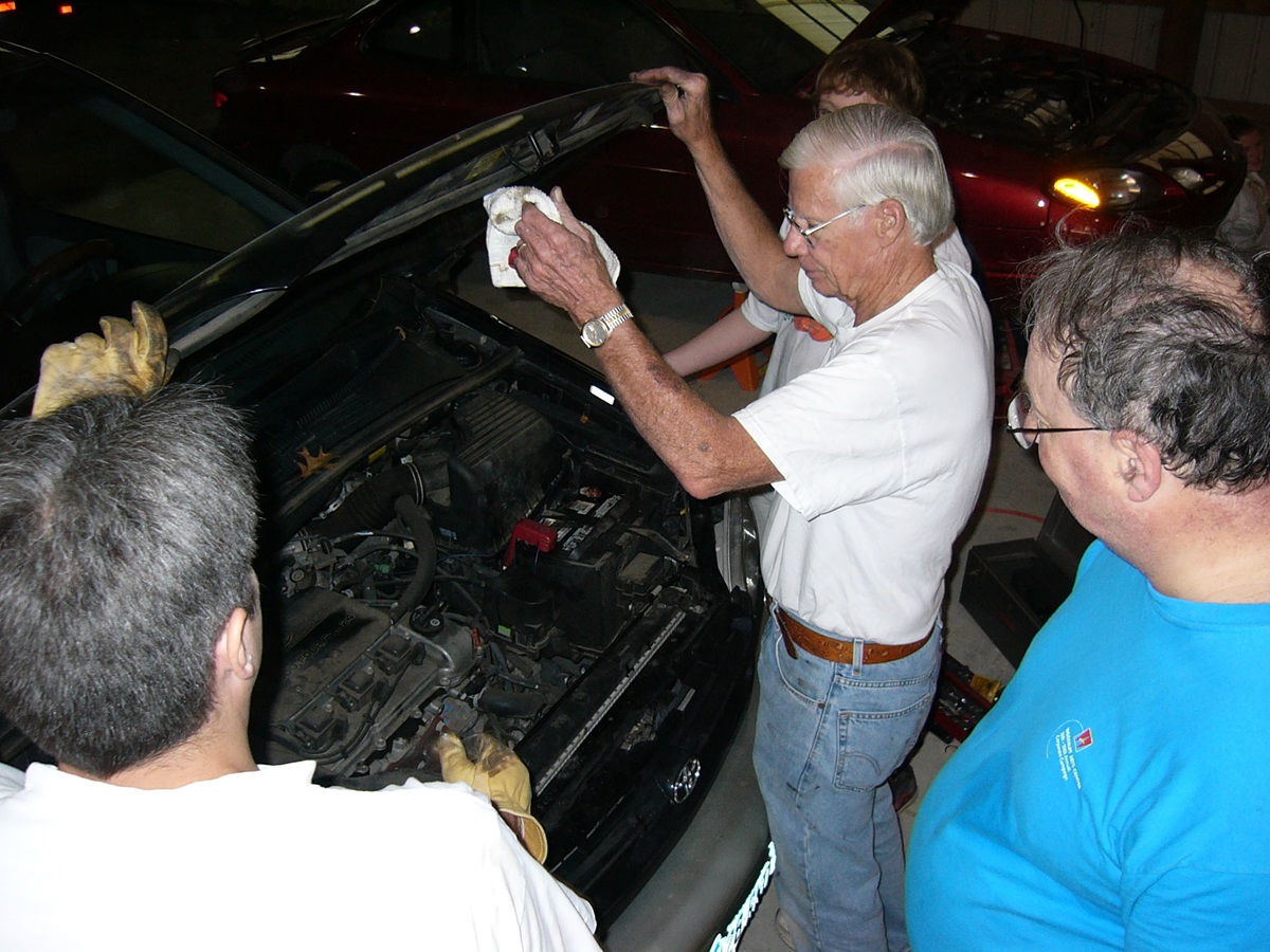 Volunteers from McEachern Memorial United Methodist Church in Powder Springs, Ga., repair cars for needy people once a month. A UMNS photo by Lyle Jackson