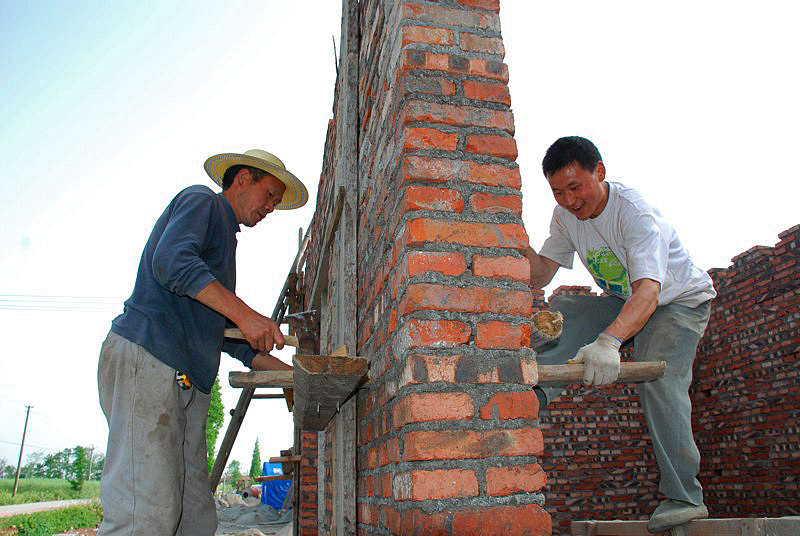 New construction in Woyun must meet strict earthquake-proof standards. A UMNS Web-only photo courtesy of Amity Foundation.