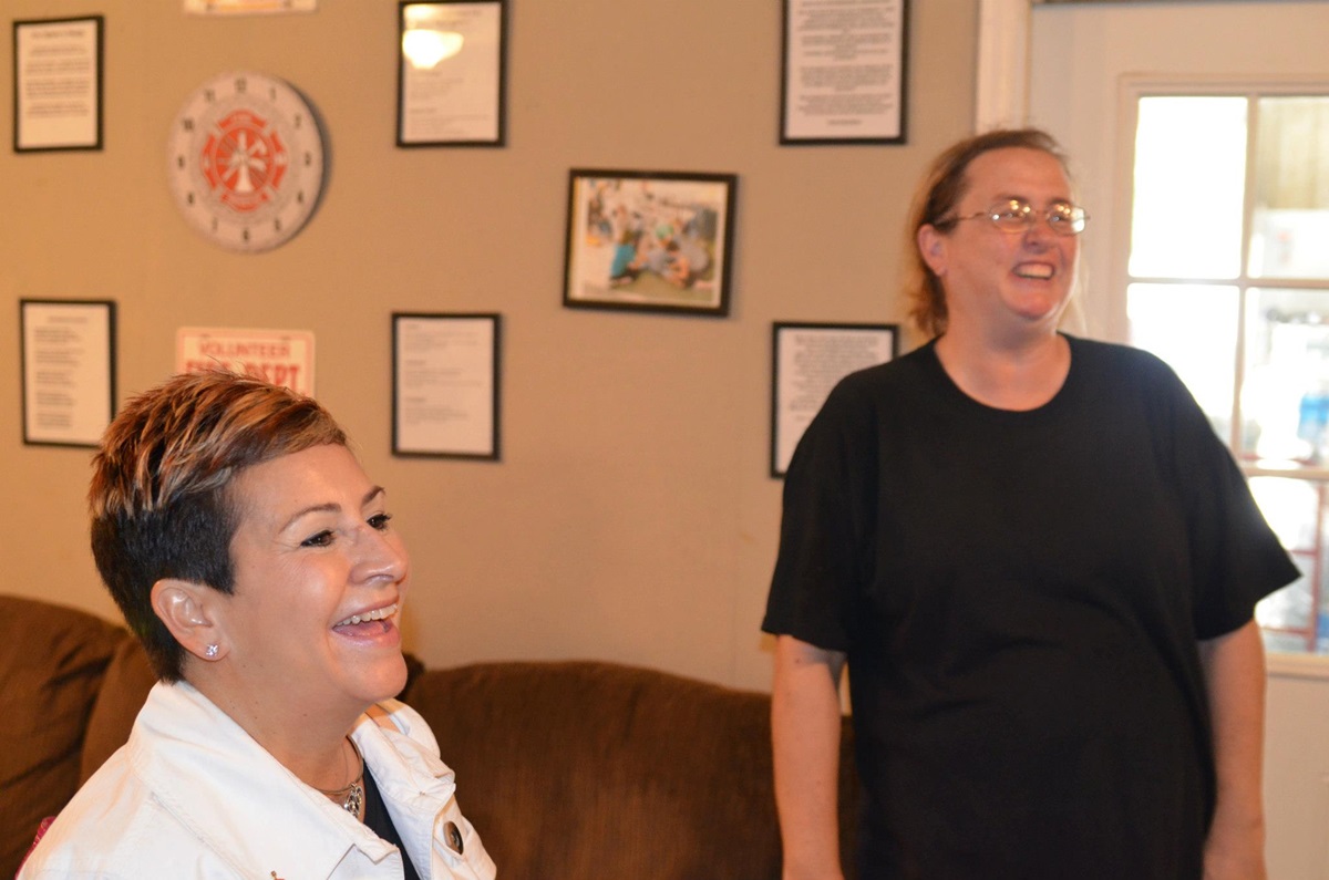 Bishop Cynthia Fierro Harvey of the Louisiana area visits with Samantha Breaud, fire chief for the Maurepas volunteer fire department. Photos courtesy of Betty Backstrom.