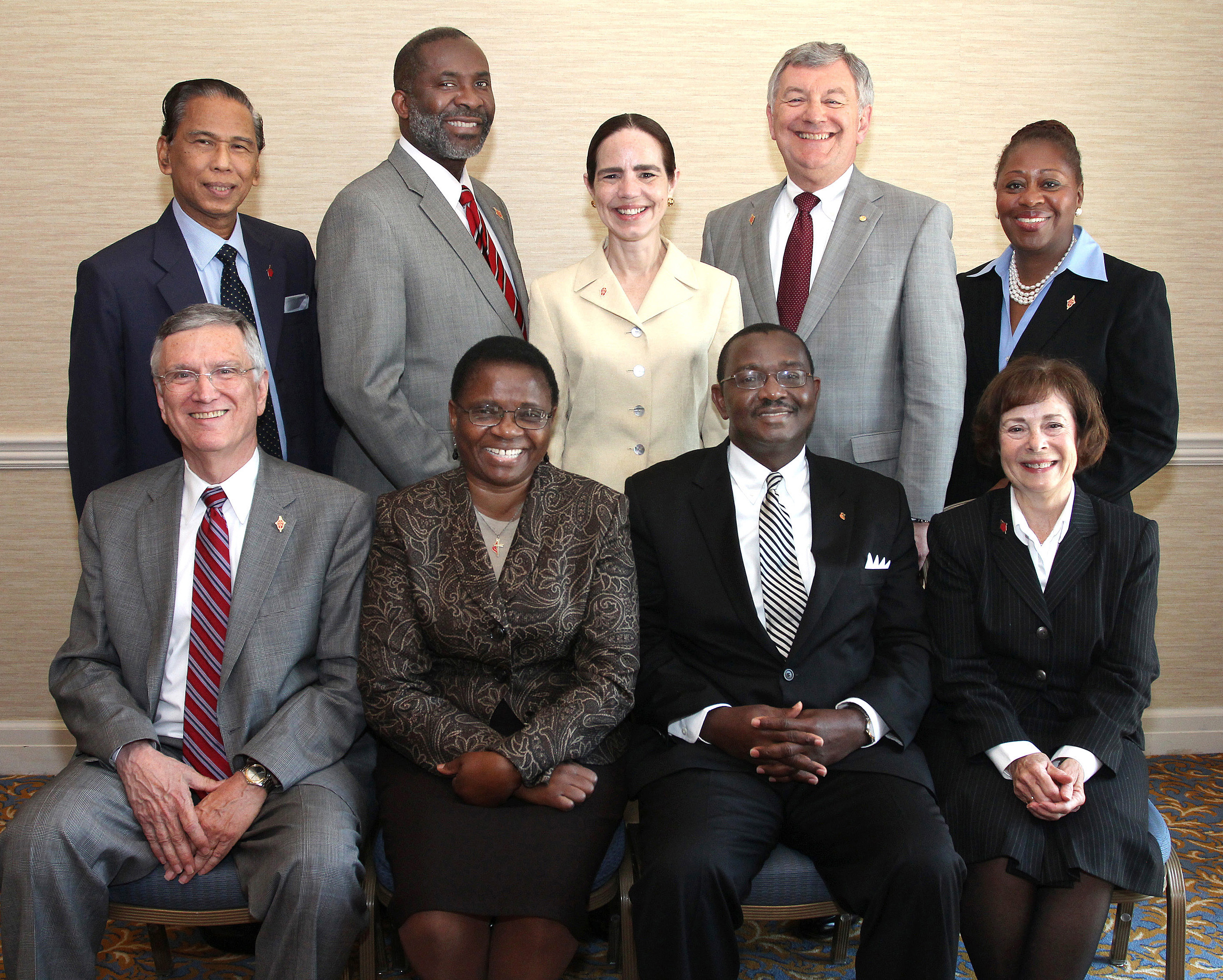 The Judicial Council for 2012-16 took up a full docket during its Oct. 24-27 session in Elk Grove Village, Ill. From left: Belton Joyner, J. Kabamba Kiboko, N. Oswald Tweh Sr., and Kathi Austin Mahle. Standing from left: Ruben T. Reyes, Dennis Blackwell, Beth Capen, William B. Lawrence and Angela Brown. A UMNS photo by Kathleen Barry.