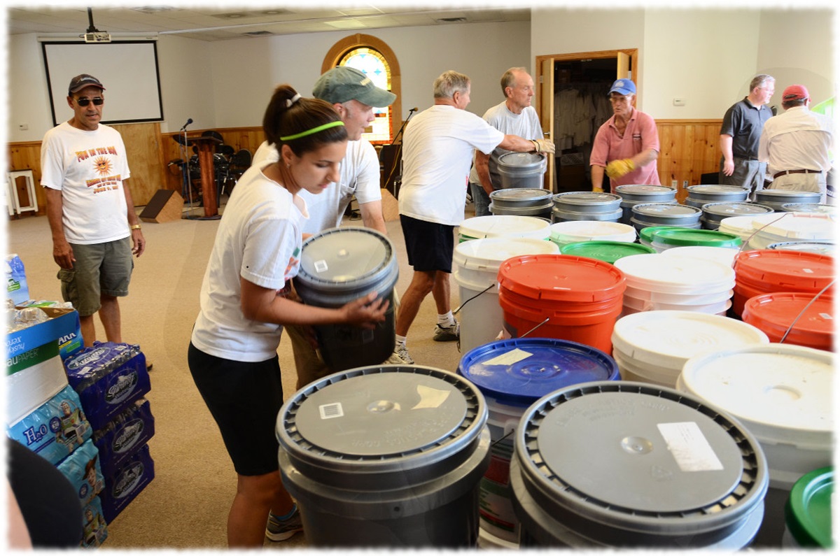 Volunteers assemble cleaning buckets in this file photo on the website of the North Carolina Conference. A file photo by Bill Norton.By Barbara Dunlap-Berg*