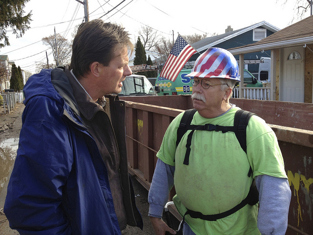 Scott Mikkelson (left), the Bethel United Methodist Church disaster relief coordinator for Hurricane Sandy, talks wth a Volunteer in Mission from the Illinois Great Rivers Conference.