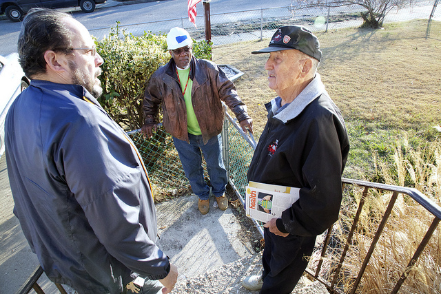 Henry Enders (right) talks with Gus Segredo (left) and the Rev. David Henry about the recovery and restoration progress in Enders’ home. Photos by the Rev. Arthur McClanahan of the Iowa United Methodist Annual Conference.