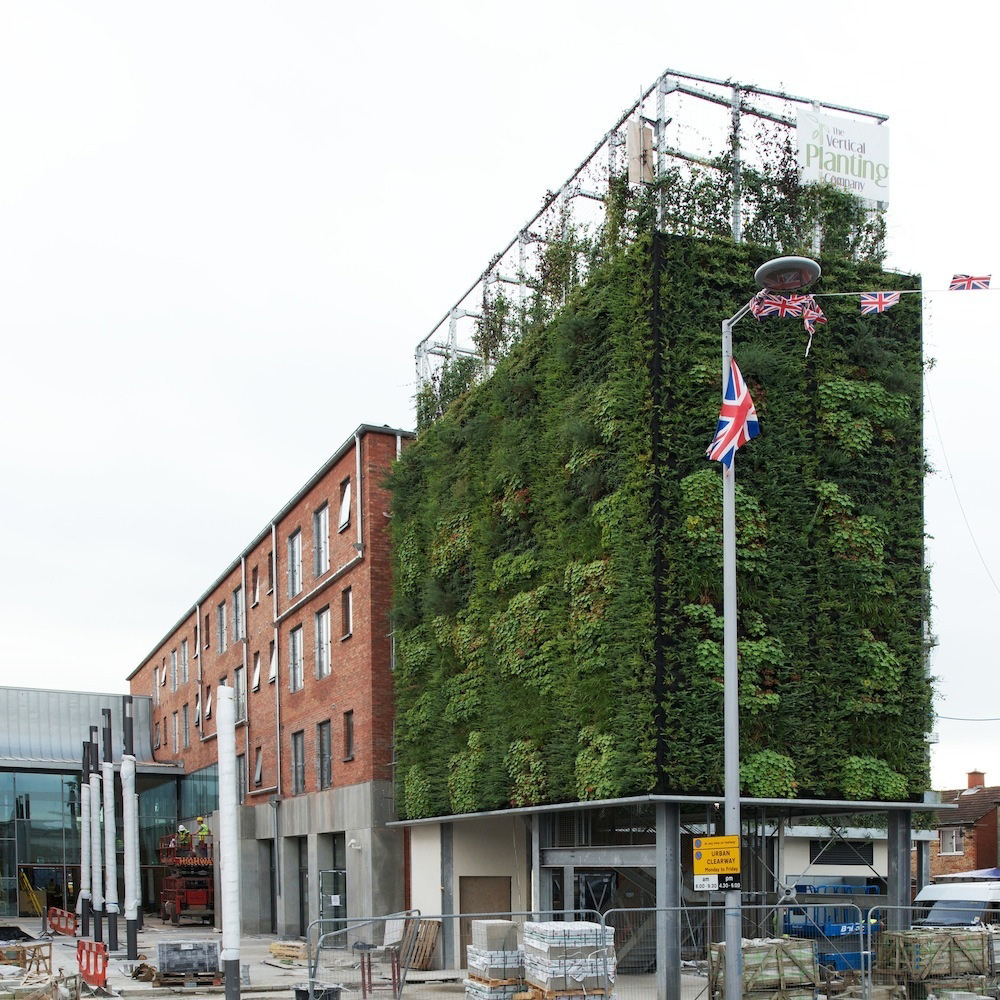 The East Belfast (UM) Mission is housed in the Skainos Center, shown here behind its vertical garden. A web-only photo courtesy of the Skainos Project.