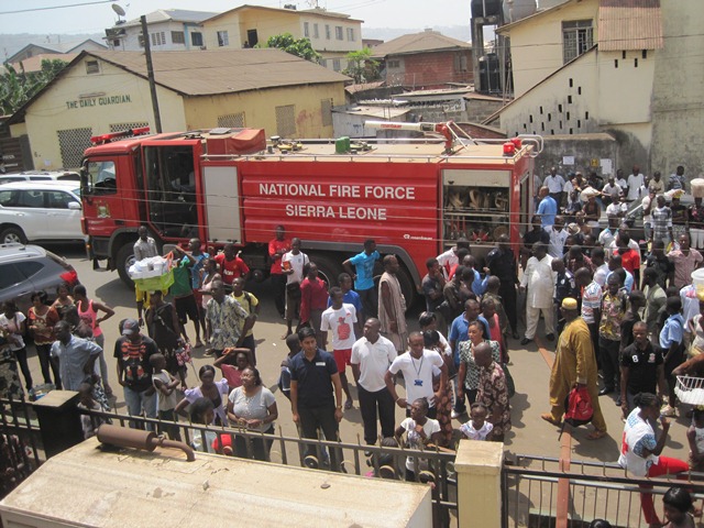 A fire Feb. 15 in the Sierra Leone Annual (regional) Conference office  killed a power authority worker and damaged the office . UMNS photos by Phileas Jusu.