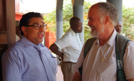 The Rev. Neal Christie, at left, talks on July 17 with Dr. Lars Bitsch-Larsen in Kindu, Democratic Republic of the Congo. Bitsch-Larsen provides medical care in the country each summer. UMNS photo by the Rev. Clayton Childers