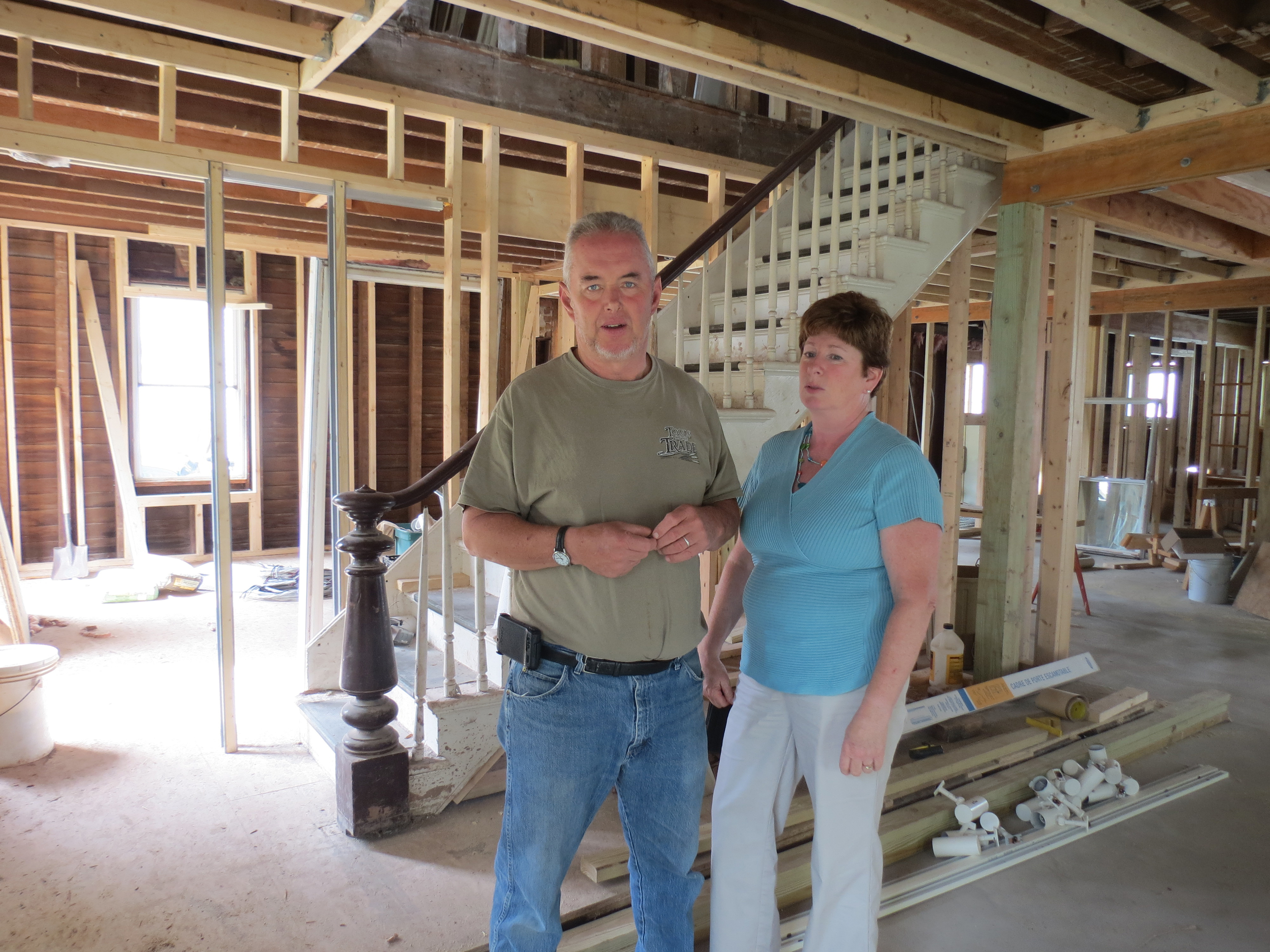 Gary and Jackie Wilkie describe work that needs to be completed in the parsonage in Prattsville, N.Y., two years after the community was ravaged by Hurricane Irene.