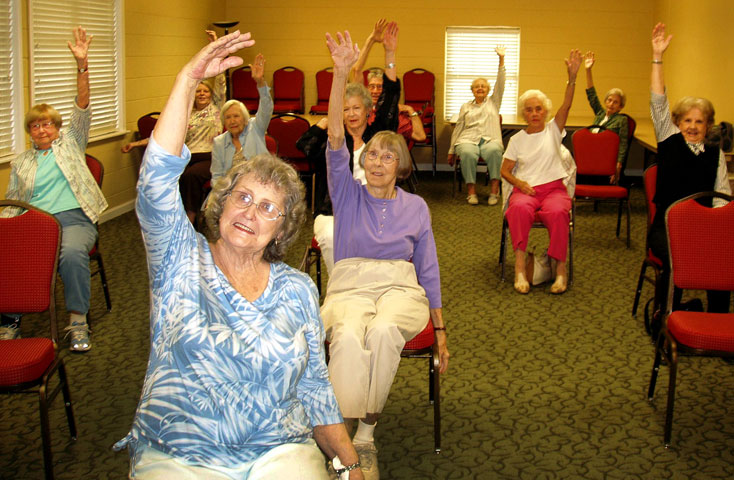 Members of the “Sittercize for the Saints” group at Killearn United Methodist Church in Tallahassee, Fla., exercise in the Asbury ministry building.