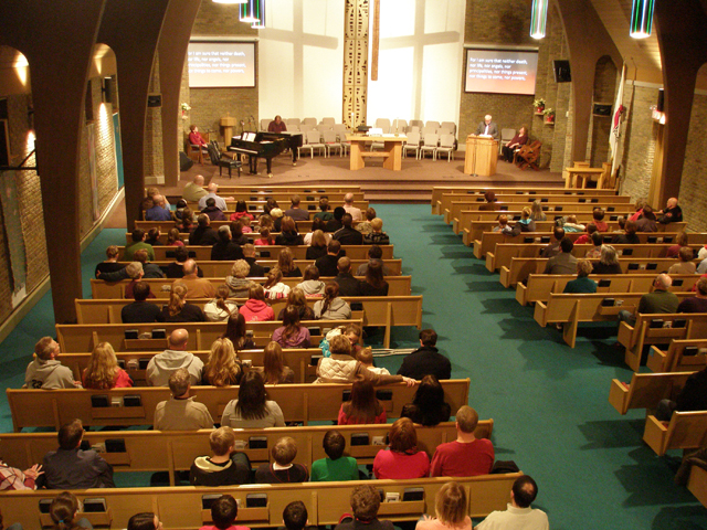 Participants at a Feb. 28, 2013 prayer vigil at Chardon United Methodist Church in Ohio found solace in sharing stories and concerns. Photo by John Eltzroth, Chardon United Methodist Church.
