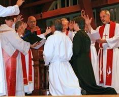 Newly elected Bishops Grant Hagiya and Elaine J.W. Stanovsky are blessed by the Western Jurisdictional College of Bishops. A UMNS photo by Marta W. Aldrich.