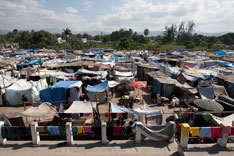 More than 5,000 Haitians live in the makeshift camp at Leogane's municipal soccer stadium.
