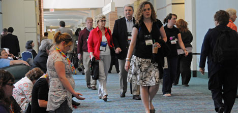 Supporters of gay, lesbian, bisexual and transgender inclusion in The United Methodist Church pray as delegates to the denomination's 2008 General Conference walk to legislative committee rooms. 