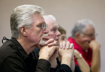 The Rev. Jim DuFriend (left) and fellow chaplains listen intently to a presentation during the United Methodist Convocation for Police, Fire and Crisis Responder Chaplains at the Scarritt Bennett Center in Nashville, Tenn.