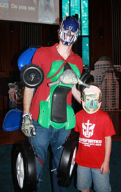 Jonatron, also known as the Rev. Jonathan Hart, stands with a little Transformer from Florida's Shalimar United Methodist Church vacation Bible school. The theme was