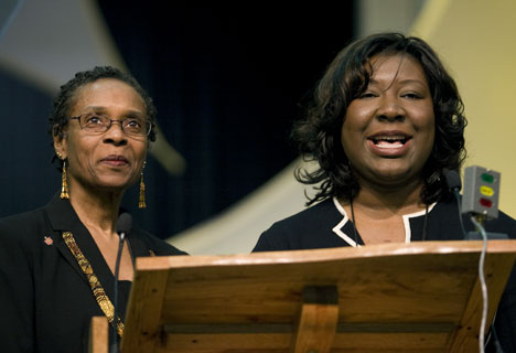 Bishop Linda Lee (left) and Erin Hawkins lead the celebration of the 40th anniversary of the United Methodist Commission on Religion and Race at 2008 General Conference.