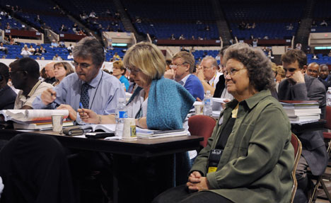 Delegates consider legislation at the 2008 United Methodist General Conference, where the assembly voted to add wording to the liturgy for profession of membership. Henceforth, people joining United Methodist churches will promise to be faithful in "their witness," as well as in their "prayers, their presence, their gifts and their service."