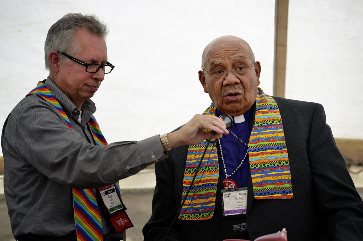 Retired Bishop Melvin G. Talbert (right) joined 14 other United Methodist bishops at a gathering on May 4 outside the 2012 United Methodist General Conference in Tampa, Fla., organized by groups that want to see the church change its stance on homosexuality. Holding the microphone is the Rev. Bruce Robbins, retired former pastor of Hennepin Avenue United Methodist Church in Minneapolis, A UMNS photo by Paul Jeffrey.