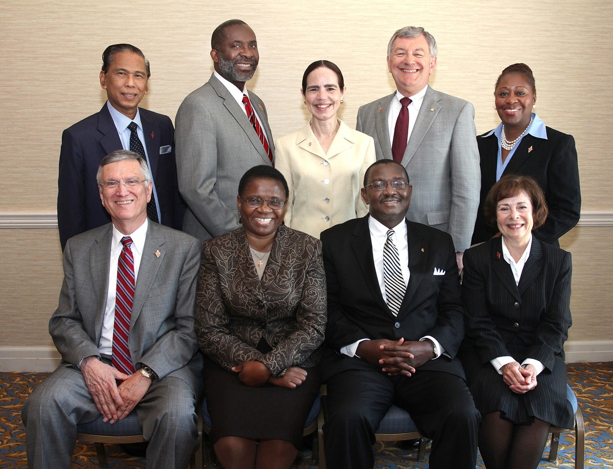 The Judicial Council for the 2012-16 Quadrennium pose for a group photo during the 2012 United Methodist General Conference in Tampa, Fla. Seated, from left: Belton Joyner, J. Kabamba Kiboko, N. Oswald Tweh Sr., and Kathi Austin Mahle. Standing from left: Ruben T. Reyes, Dennis Blackwell, Beth Capen, William B. Lawrence and Angela Brown. A UMNS photo by Kathleen Barry