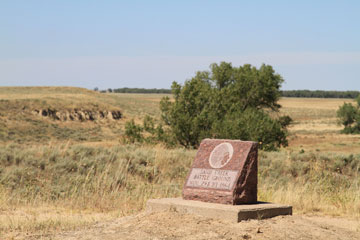 A stone marker commemorates the date, Nov. 29-30, 1864, of the slaughter.
