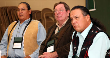 Reginald Killsnight, Sr., David Halaas and Otto Braided Hair listen during a dialogue about the Sand Creek Massacre.