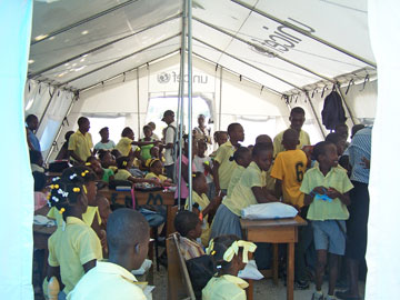 Four classes from Mellier school meet in a donated UNICEF tent at the Mellier Methodist Church compound.