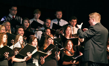 Nathan Windt directs the Concert Choir at Tennessee Wesleyan College in Athens, Tenn. A UMNS photo courtesy of Tennessee Wesleyan College.