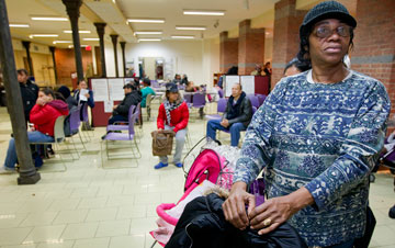 Louise Davis waits for her turn to shop at the West Side Campaign Against Hunger food pantry. A UMNS photo by Mike DuBose.