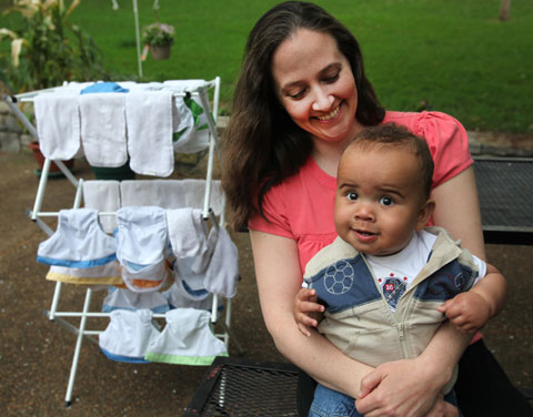 Heather Bennett strives to live an eco-friendly life. She uses only cloth diapers on her 8-month-old son, Tyler. Photo by Kathleen Barry, UMNS.