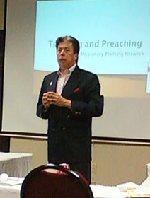 The Rev. David Wilson, superintendent of the Oklahoma Indian Missionary Conference, talks to the conference. A UMNS web-only photo by Tammy White.