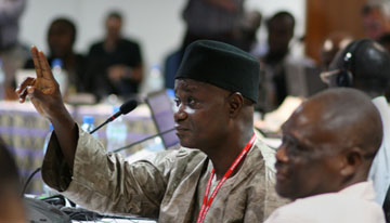 Elisha Mazadu Bakila, Nigeria, asks for clarification during the Pan African health board summit.
