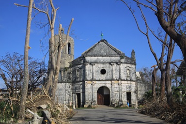 A church stands amidst the ruins caused by Typhoon Haiyan in the village of Daanbantayan, northern Cebu, Philippines. A UMNS photo by Ray Buchanan. A church stands amidst the ruins caused by Typhoon Haiyan in the village of Daanbantayan, northern Cebu, Philippines. A UMNS photo by Ray Buchanan.