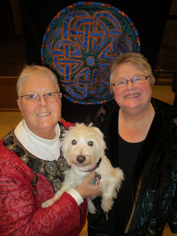 The Rev. Joanne Carlson Brown (left), Thistle the Wonder Westie and the Rev. Christie Lagergren Brown. Photo courtesy of the Browns.