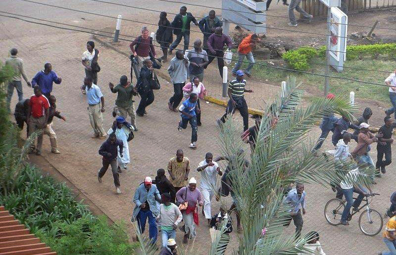 Crowds flee during the sound of gunfire near Westgate mall in Kenya. Photo by Anne Knight/Creative Commons.