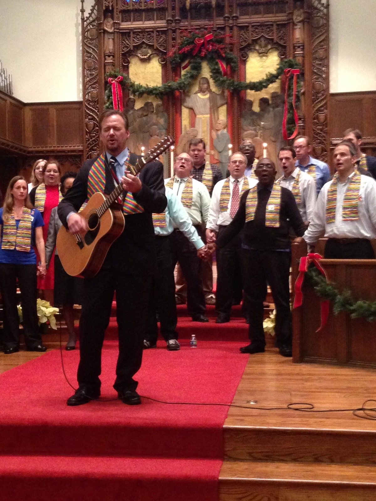 Frank Schaefer leads the congregation in singing “We Shall Overcome” during a Dec. 22 worship service at Foundry United Methodist Church in Washington. A UMNS photo by Erik Alsgaard, Baltimore-Washington Annual Conference.