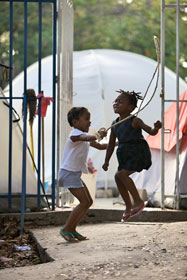 Schoolchildren from the College de Freres enjoy skipping rope. 