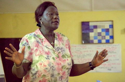   The Rev. Yatta Young, dean of the Gbarnga School of Theology at United Methodist University in Liberia, challenges the church to become proactive in advocating against violence and human rights violations during the Christmas Institute seminar Dec. 15-18 in Gbarnga City in rural Liberia. Photos by the Rev. Clayton Childers, United Methodist Board of Church and Society.
