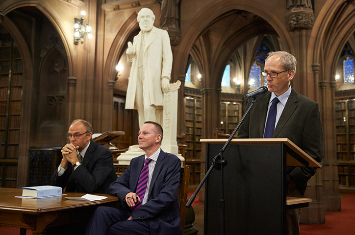 Co-editors Gareth Lloyd (at lectern) and Kenneth Newport (left) spoke recently about the book "The Letters of Charles Wesley." Professor Jeremy Gregory (center) of the University of Manchester moderated the session. A web-only photo reproduced by courtesy of the University Librarian and Director, The John Rylands Library, The University of Manchester.