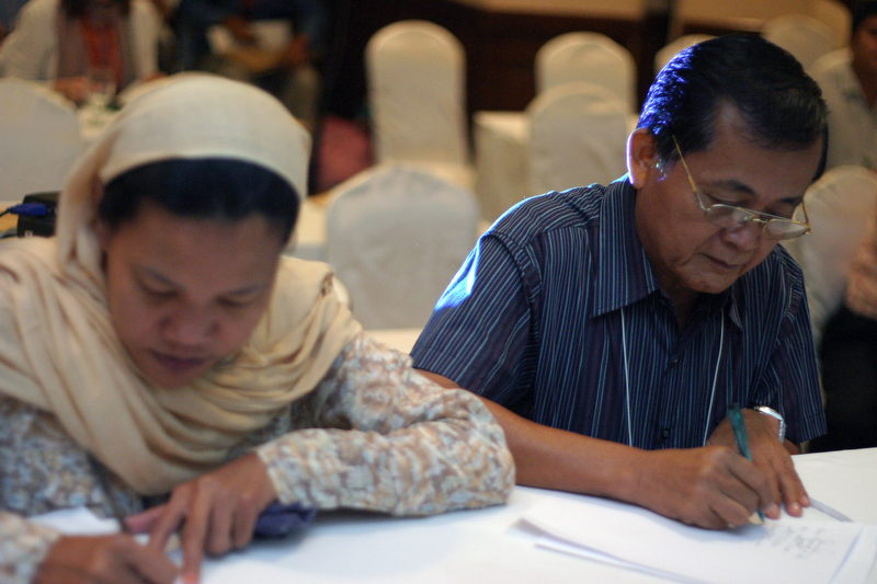 Hadja Fauziah Musa and the Rev. Julius Camanong participate in a Muslim-Christian Peace Building Dialogue in Davao City, Philippines, in 2007.