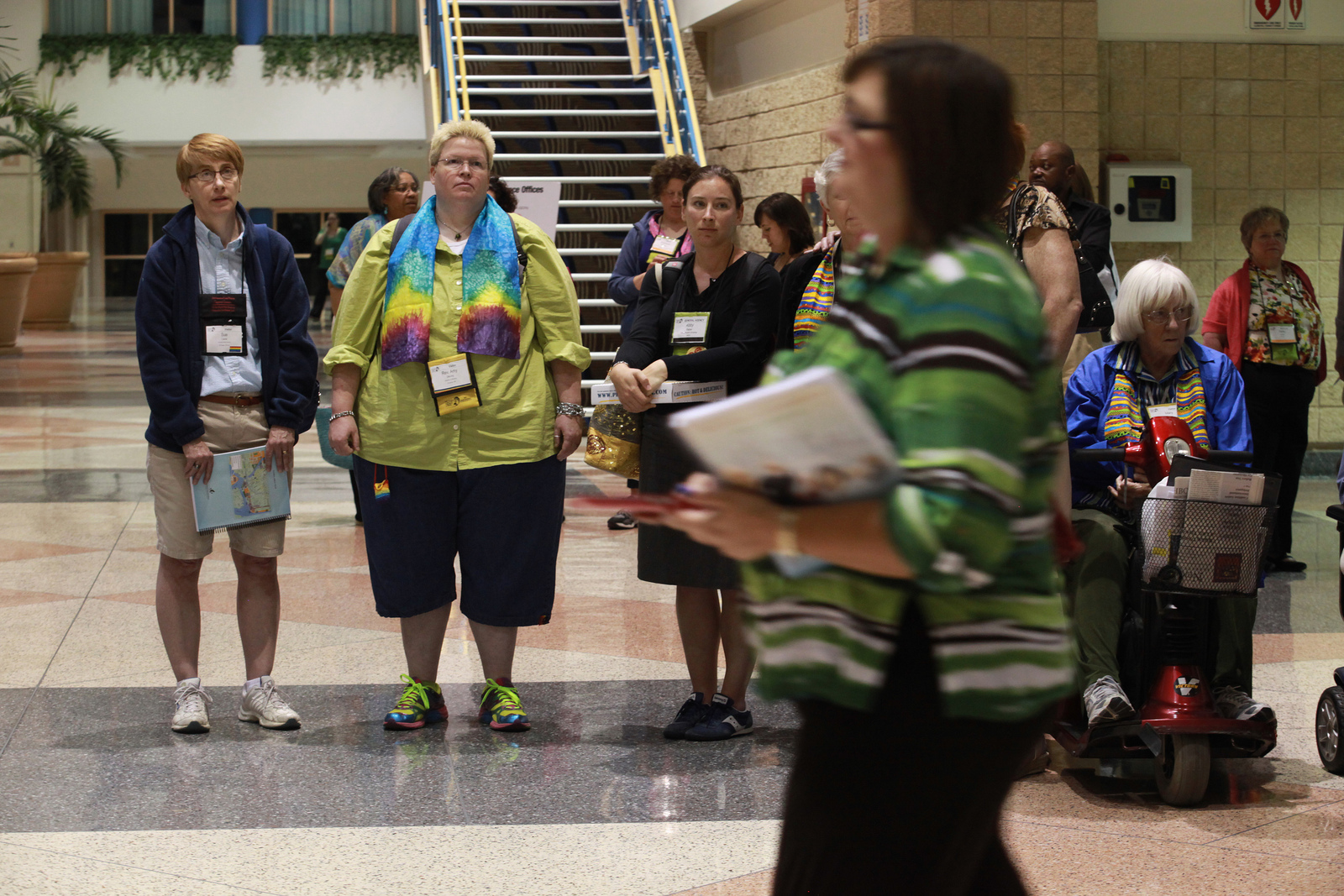 A quiet demonstration in support of full inclusion of gays and lesbians in the life of The United Methodist Church occurs as delegates and visitors leave the April 26 plenary session of the 2012 General Conference in Tampa, Fla.   