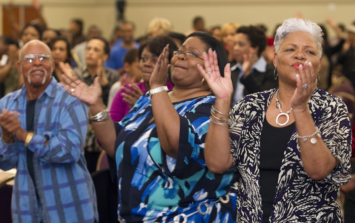 Worshipers sing during a Wednesday evening gathering at Kindgom Builders Center, Windsor Village United Methodist Church in Houston in this 2011 file photo. Photo by Mike DuBose, UMNS.