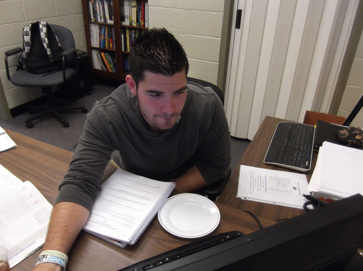 First generation student Chris Liberati studies at Adrian College.
